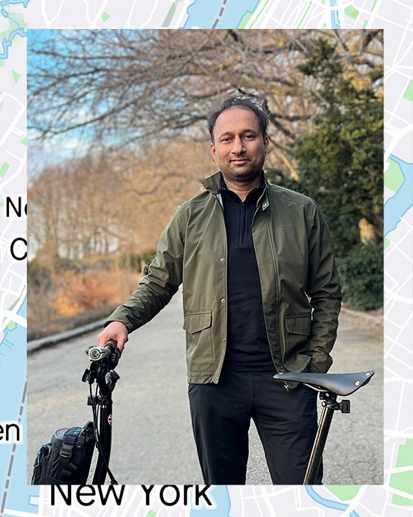 Image of Adeet D., Brompton Electric Owner, with a Brompton bike overlayed on image of New York map