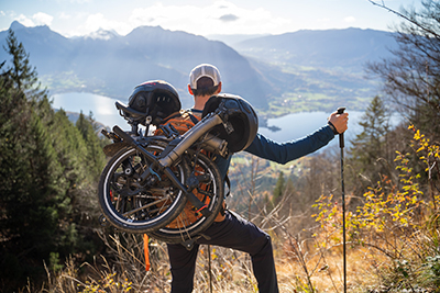 Antoine Taillefer with a Brompton T Line overlooking Lake Annecy