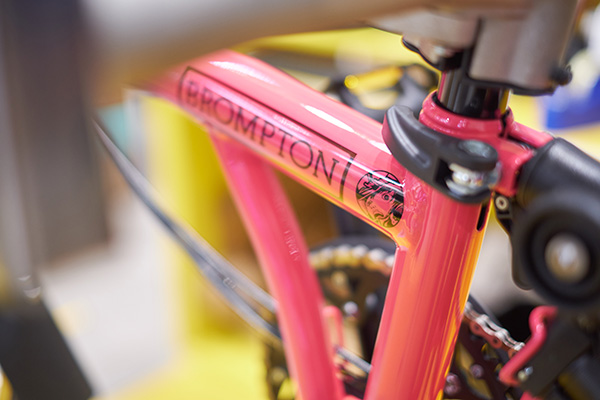 A close up of a pink Brompton mainframe