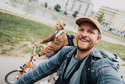 Lennart and his girlfriend riding Bromptons in Vienna.